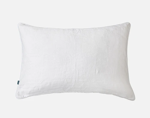 Front view of our Chalkstone Pillow Sham with a natural stone-like white textured surface.