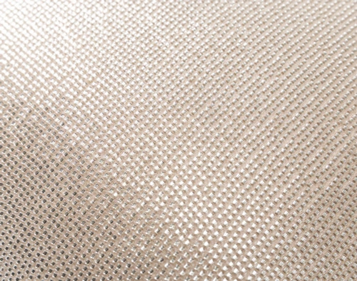 Close-up on the shimmering surface of our Beaded Square Cushion Cover in Champagne.