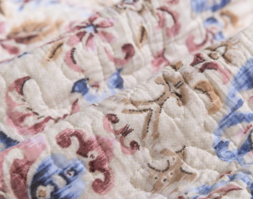 Close-up on the medallion print designs on our Misha Cotton Quilt Set.