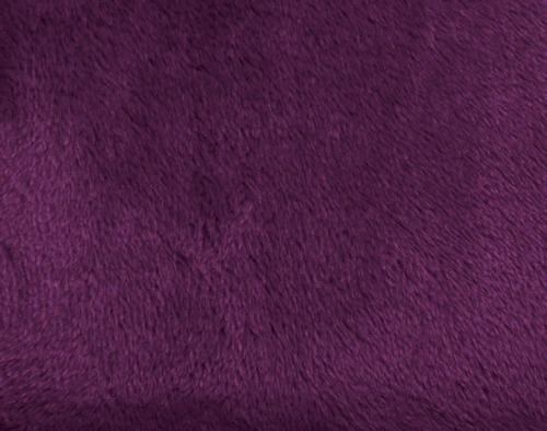 Close-up on our Velvet Plush Throw in Purple to show its soft velveteen texture.