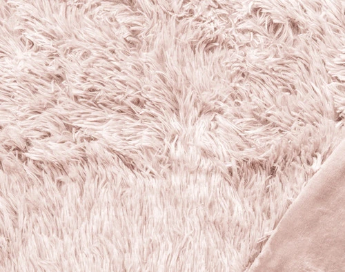 Close-up on the frosty tipped surface and solid reverse on our Frosted Shaggy Throw in Woodrose.