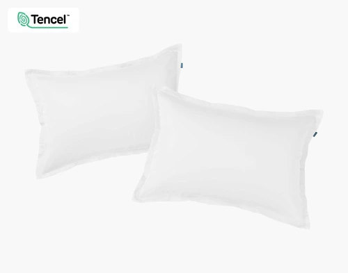 Front view of two BeechBliss TENCEL™ Modal Pillow Shams in White sitting adjacent on a solid white background.