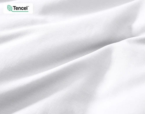 Close-up on our Hemp Touch Duvet Cover in White to show its soft fabric and colour.