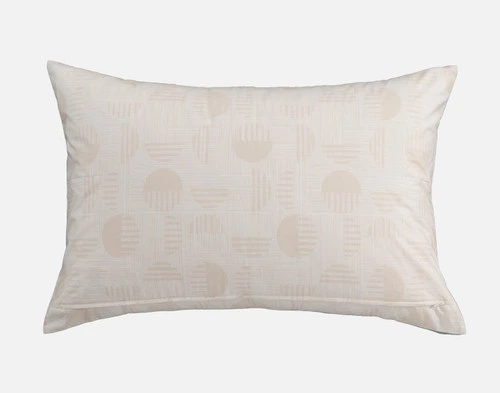 Front view of the reverse on our Nora Pillow Sham resting on a solid white background.