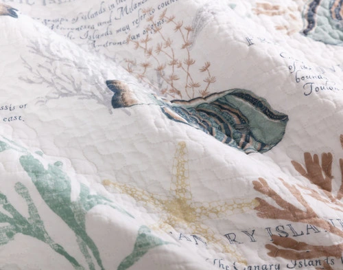 Close-up on the ruffled cotton surface on our Marella Cotton Quilt Set.