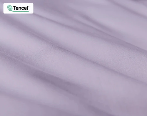 Close-up of our Eucalyptus Luxe TENCEL™ Lyocell Duvet Cover in Lilac to show its fabric lightly ruffled.