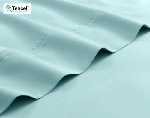 Close-up on the edge of the flat sheet for our Eucalyptus Luxe TENCEL™ Lyocell Sheet Set in Shoreline Blue.