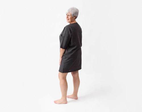 Back view of a woman wearing our Linen Blend Lounge Tunic in Black Pearl.