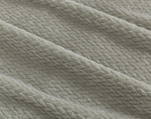 Close-up on the chevron plush texture on our Grey Chevron Plush Blanket.