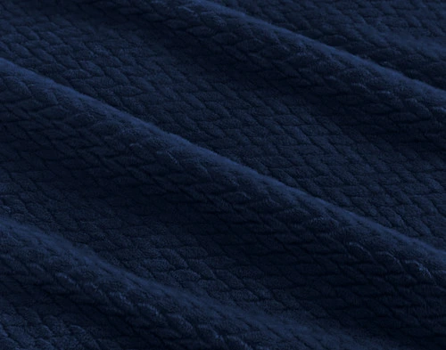 Close-up on the chevron plush texture on our Navy Chevron Plush Blanket.