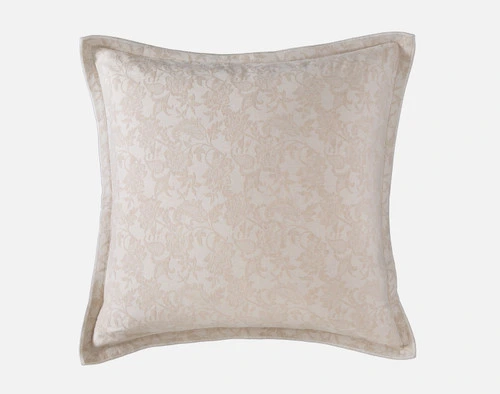 Front view of the embroidered jacquard surface on our Prescott Pillow Sham resting against a solid white background.