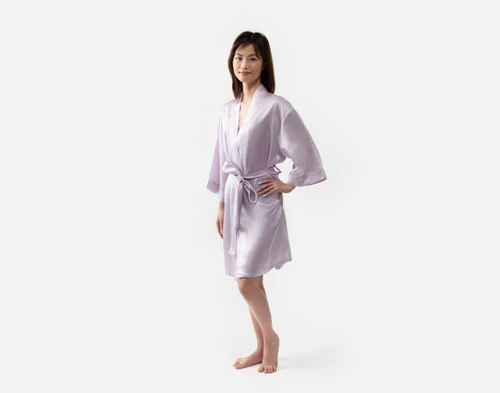 Our Lavender Silk Kimono Robe being worn by a young woman with a slim build.