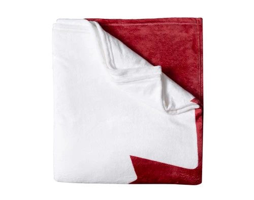 Our Canada Flag Fleece Throw folded neatly into a tidy square.