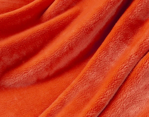 Close-up on our Velvet Plush Throw in Bonfire to show its soft velveteen texture.