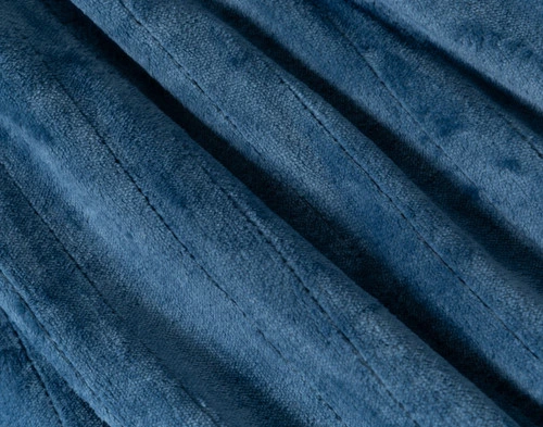 Close-up of the subtle stitched lines and plush velour surface of our Teal Blue Plush Electric Heated Throw.