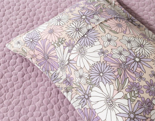 Reverse view of the floral pattern and envelope enclosure on a pillow sham for our Lavender Daisy Chain Quilt Set.