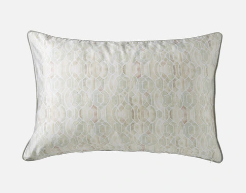 Reverse view of our Sasha Pillow Sham to show its trellis pattern on a solid white ground.