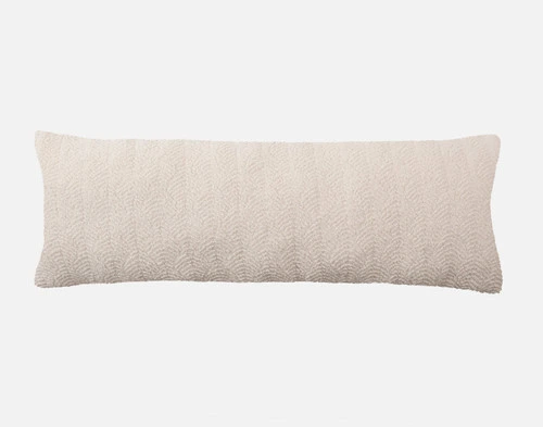 Front view of the soft, textured surface on our Ripple Boucle Lumbar Pillow in Cream on a white background.