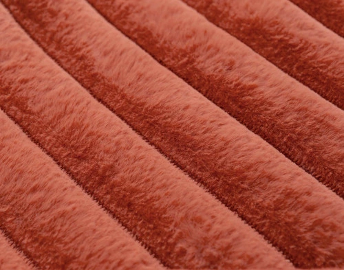 Close-up of the straightened textural stripes on our Red Cedar Channel Plush Throw.