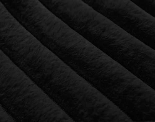 Close-up of the straightened textural stripes on our Black Channel Plush Throw.