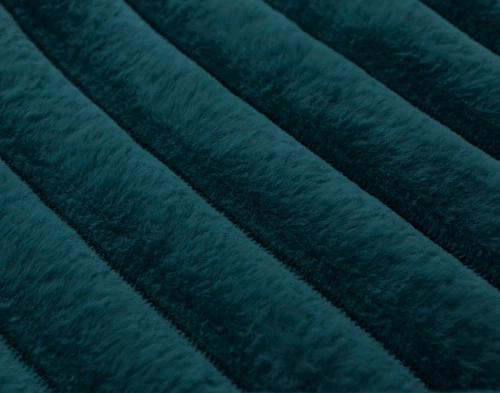 Close-up of the straightened textural stripes on our Deep Sea Channel Plush Throw.