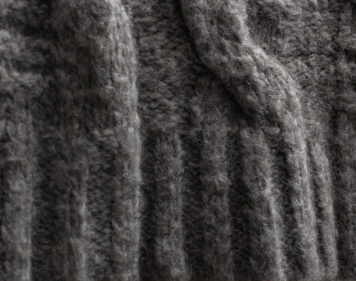 Close-up on the ribbed border on our Grey Fisher Knit Throw.