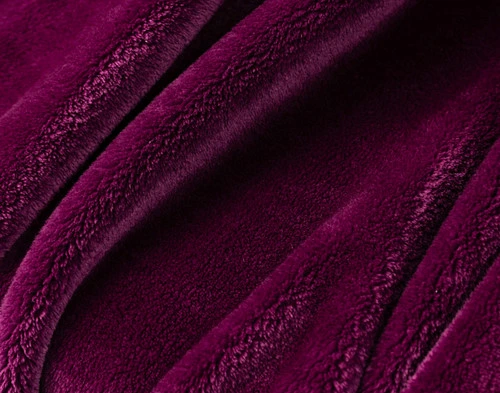 Close-up on our Velveteen Throw in Purple Rain to show its soft plush texture.