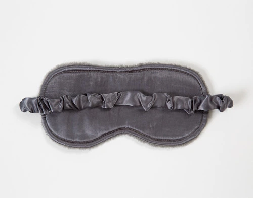 Reverse view of the smooth surface on the sleep mask from our Travel Mate Set in Grey.