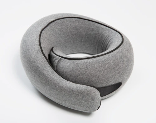 Angled view of our Neck-Hug Travel Pillow folded inward, as if it would be comfortably cradling around someone's neck.