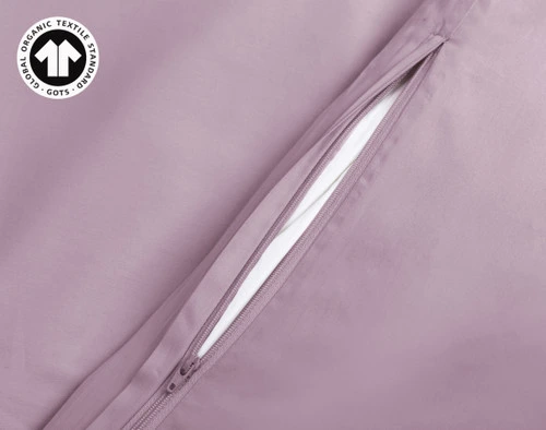 A close up of our Organic Cotton Duvet Cover in Amethyst Purple, showing the opening with the YKK zipper.