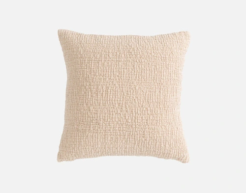 Front view of our Crinkle Square Cushion Cover in Sand sitting in front of a solid white backdrop.