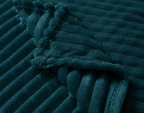 Folded corner of our Coastal Ribbed Plush Blanket.