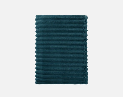 Top view of our Coastal Ribbed Plush Blanket folded into a tidy rectangle.