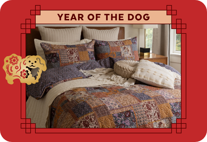 A graphic representing the Year of the Dog, showing our Amara Duvet Cover with a red border.