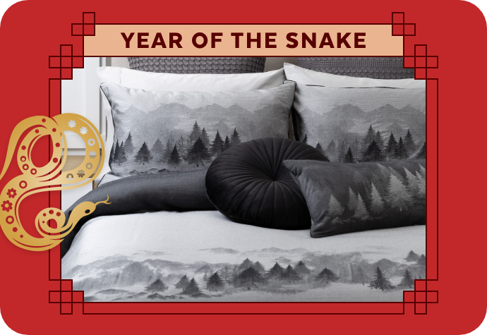 A graphic representing the Year of the Snake, showing our Plateau Duvet Cover with a red border.