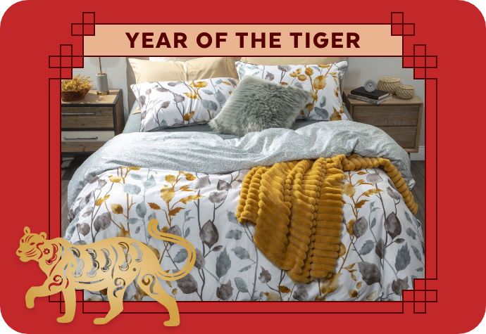 A graphic representing the Year of the Tiger, showing our Villeray Duvet Cover with a red border.
